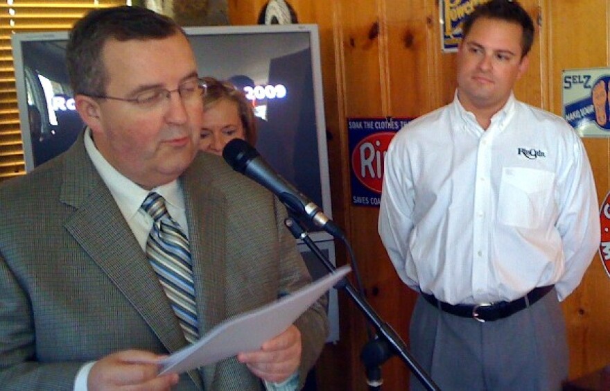 BOK Center Manager John Bolton announces the Rock and Ribs Festival as Mayor Kathy Taylor and a Rib Crib executive looks on during news conference.