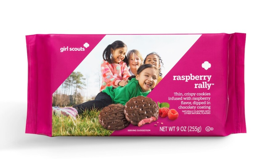 pink cookie packaging feature four young girls smiling in a grassy area