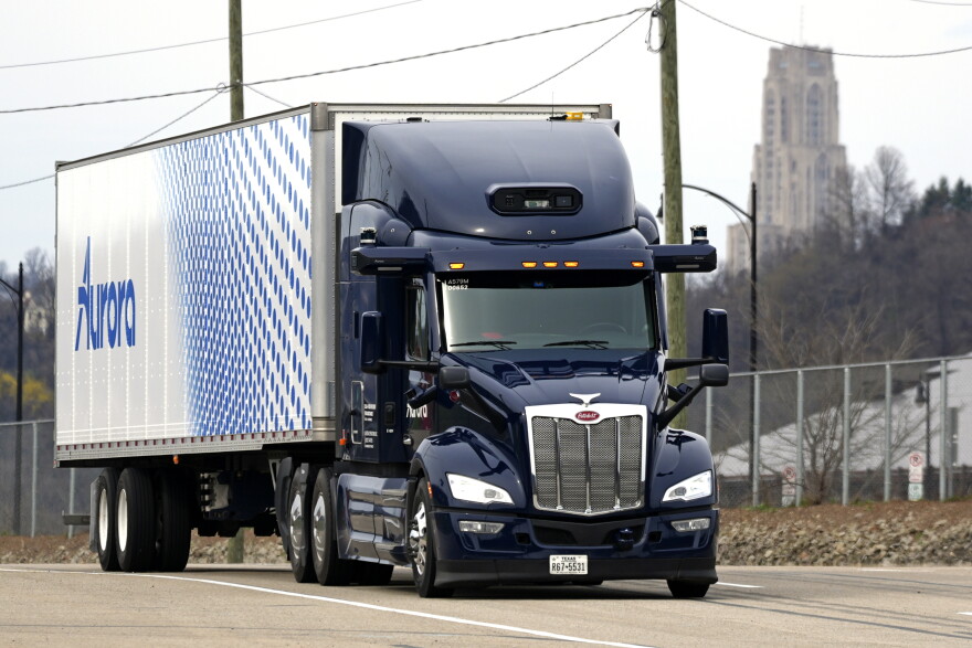 A self-driving tractor trailer maneuvers around a test track in Pittsburgh, Thursday, March 14, 2024. The truck, outfitted with 25 laser, radar and camera sensors, is owned by Pittsburgh-based Aurora Innovation Inc. Late this year, Aurora plans to start hauling freight on Interstate 45 between the Dallas and Houston areas with 20 driverless trucks.