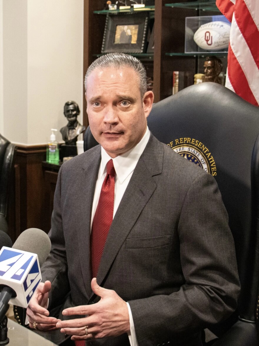 Oklahoma House Speaker Charles McCall talks to reporters in his office at the Oklahoma State Capitol.