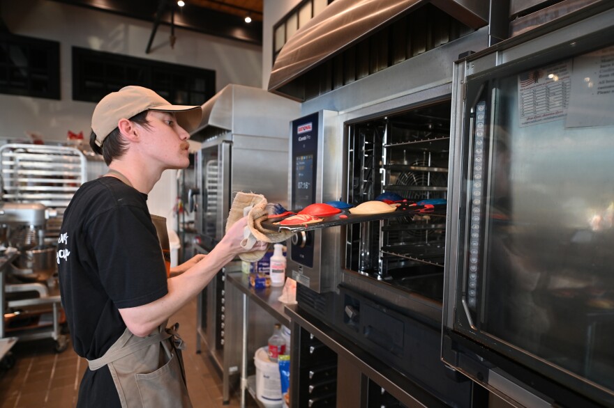 Brian Boston checks the pancakes.