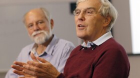 Richard Henderson, one of the 2017 Nobel Prize winners in Chemistry, speaks during a press conference beside director Sir Hugh Pellham at the Laboratory of Molecular Biology in Cambridge, England, Wednesday, Oct. 4, 2017. Three researchers based in the U.S., U.K. and Switzerland won the Nobel Prize in Chemistry on Wednesday for developments in electron microscopy. The 9-million-kronor ($1.1 million) prize is shared by Jacques Dubochet of the University of Lausanne, Joachim Frank at New York's Columbia University and Richard Henderson of MRC Laboratory of Molecular Biology in Cambridge, Britain. (Frank Augstein/AP)