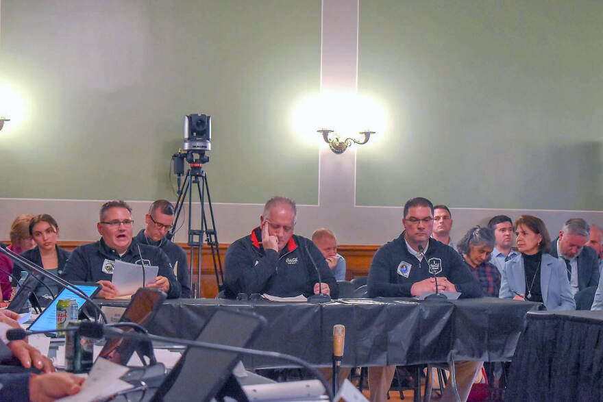 Left to right are Joe Maggiacomo, manager of Coca Cola’s Providence distribution center; John Holahan, general manager of Coca Cola Beverages Northeast; and Frank Cardosa, warehouse manager at the Providence facility. They testified against the latest bottle bill proposals before the Senate Committee on Environment and Agriculture on May 7, 2025.