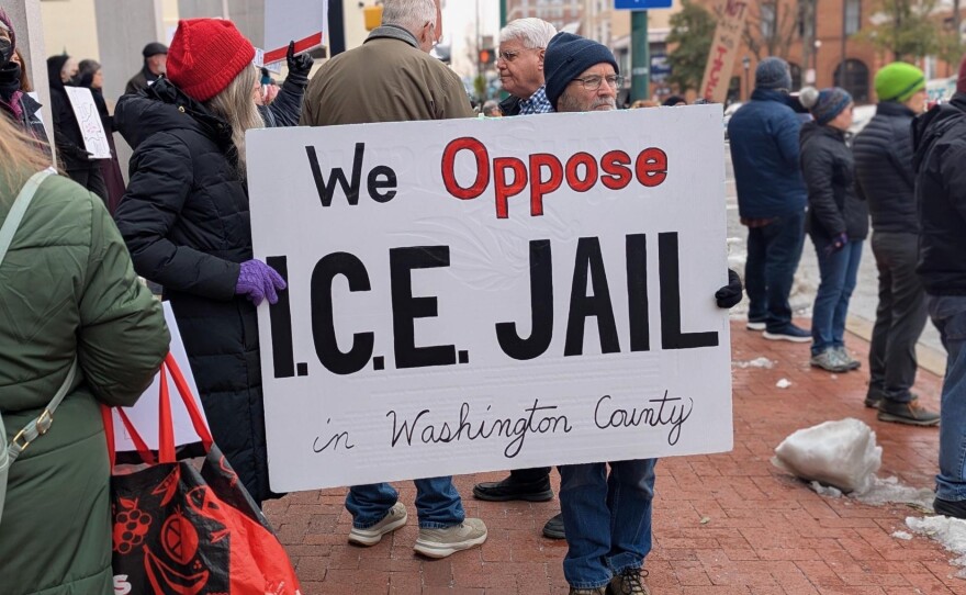 A sign reads "We oppose ICE jail in Washington County" as protesters gather in Washington County, Md on February 10, 2026.