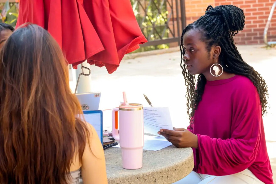 Kelma Ngwa Amambua, 21, of The Gambia studies with friends at Bethany Lutheran College on Aug. 27.