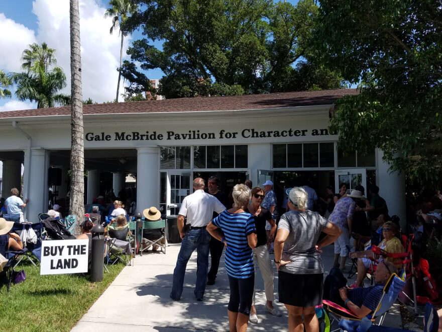 The crowd attending a water quality panel discussion spilled out of the riverside Gail McBride Pavillion at the Burroughs Home in Fort Myers.