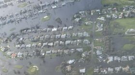 A U.S. Coast Guard aircrew from Air Station Miami, Florida, conducts overflights around the Fort Myers area in the wake of Hurricane Ian, Sept. 29, 2022. Some of the things crews look out for are people in distress, scope of damage, and potential pollution.