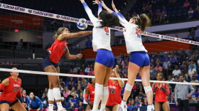 Florida opposite hitter Logan King (8) and middle blocker Alec Rothe (25) block during a volleyball match against the Ole Miss Rebels at the O'Connell Center in Gainesville, Fla., Sunday, Oct. 25, 2026. (Reagan Bresnahan/WRUF)