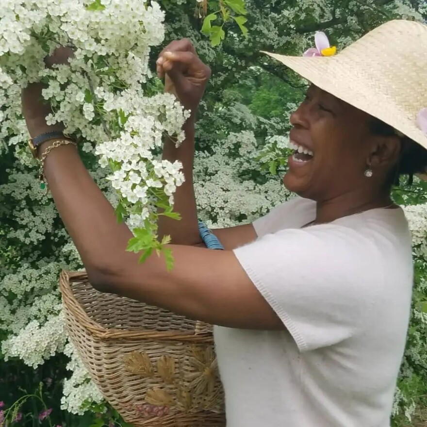 Shalina Rankin at work in her herbal garden.