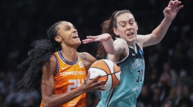 Connecticut Sun forward DeWanna Bonner (24) goes to the basket against New York Liberty forward Breanna Stewart (30) during the first half of Game 2 of a WNBA basketball playoffs semifinal Tuesday, Sept. 26, 2023, in New York. (AP Photo/Mary Altaffer)