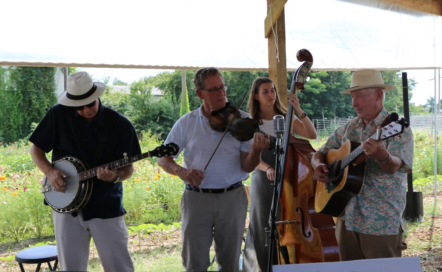 Local band "Palmetto Blue" play bluegrass for the farmers market.