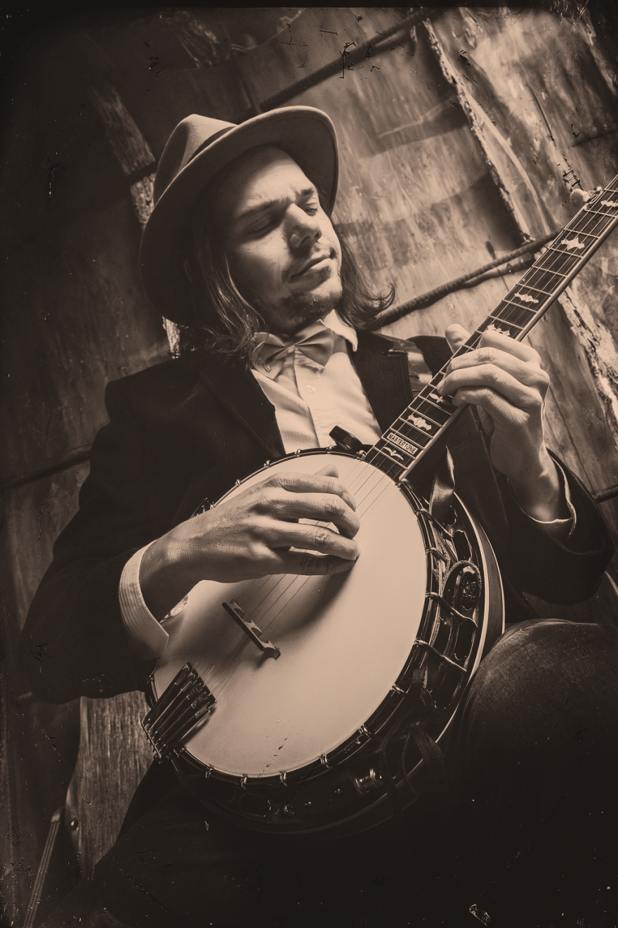 Michael Newsome, trigger finger on the banjo