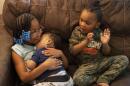 Siblings spend time together while at home during Spring Break in Niagara Falls, N.Y., on Monday, April 3, 2023. (Lauren Petracca/AP)