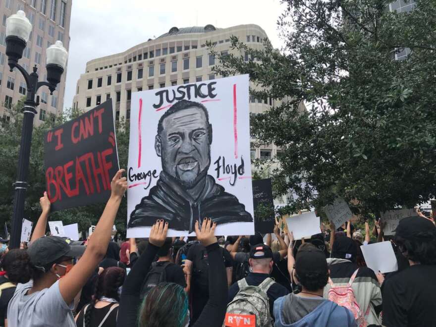 Protesters gather in front of Orlando city hall on Tuesday. Photo: Danielle Prieur, WMFE