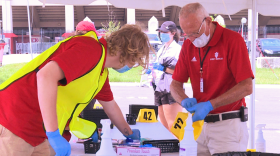 IU staff prepare to test students returning to campus at Memorial Stadium.