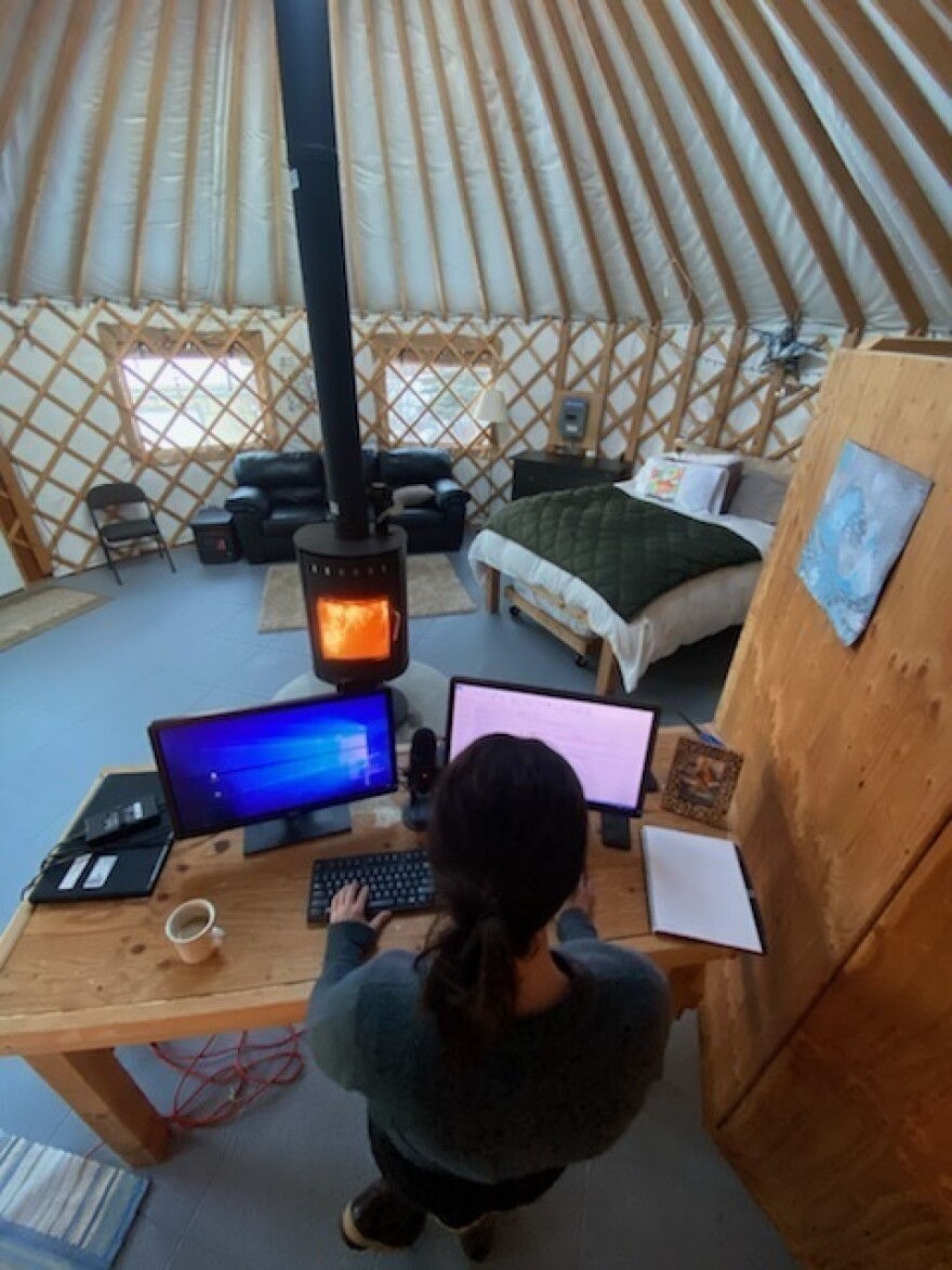 Dr. Anne Zink works from a yurt behind her family home, with three phones and three laptops, sometimes starting at 4 a.m.