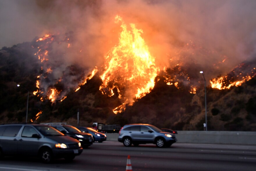 The Getty Fire burns near the Getty Center along the 405 freeway north of Los Angeles on Monday.