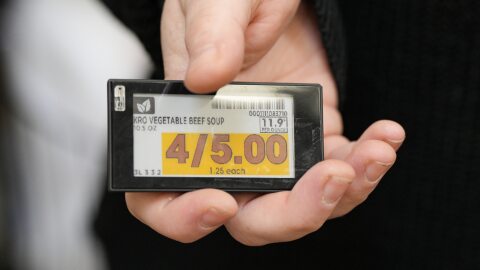 FILE - Electronic grocery labels are displayed at a Kroger grocery store, in Monroe, Ohio.