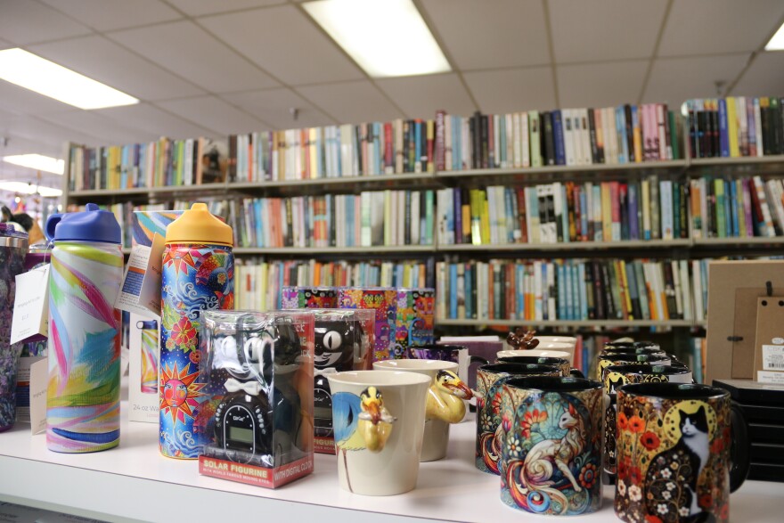Mugs, toys and water bottles are examples of other items for sale at Book Gallery West. The store was named Best Gift Store by The Gainesville Sun in 2025. (Kevin Perez/WUFT News)