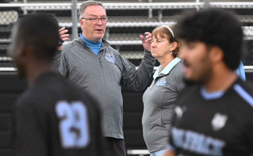 Jack and Sherry Nolan watch the team warm up before a game against Pittston on Monday.