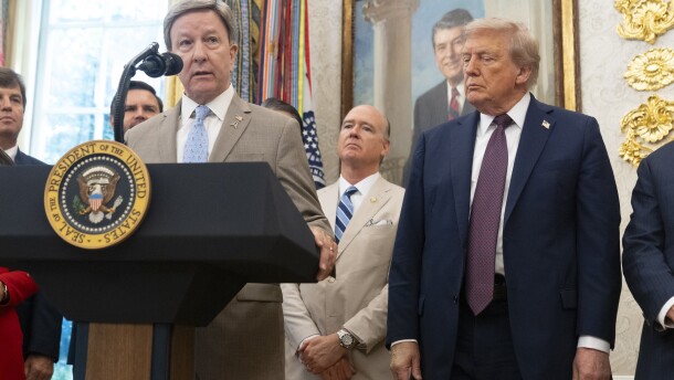 Rep. Mike Rogers, R-Ala., speaks as President Donald Trump listens in the Oval Office at the White House, Tuesday, Sept. 2, 2025, in Washington. (AP Photo/Mark Schiefelbein)