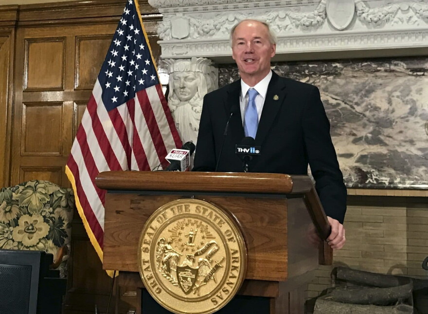 Arkansas Gov. Asa Hutchinson speaks to reporters in Little Rock, Ark., in April 2017. (Andrew DeMillo/AP)