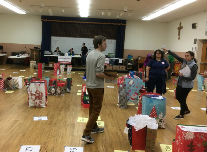 Holy Trinity Catholic Church school assembly room filled with gift bags