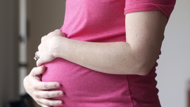 FILE - A pregnant woman stands for a portrait in Dallas, Thursday, May 18, 2023. (AP Photo/LM Otero, File)