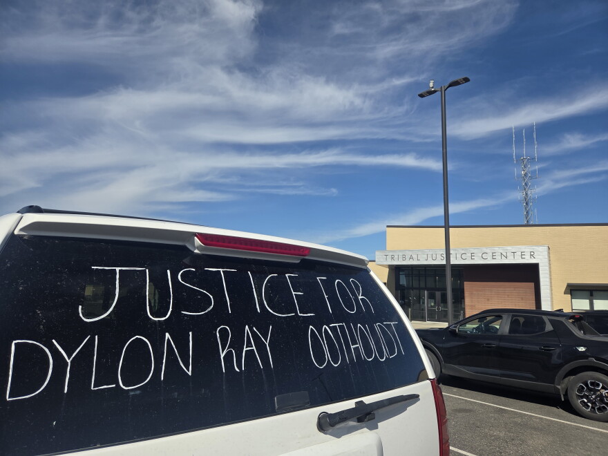 "Justice for Dylon Oothoudt" is written on the back windshield of a vehicle in the Leech Lake Tribal Justice Center parking lot in Cass Lake on Oct. 7, 2026.