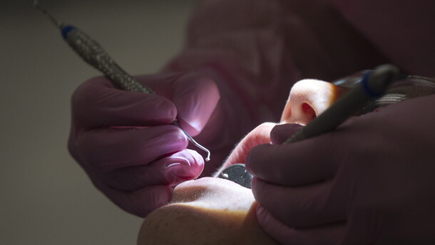 Tycee Thivierge works on a patient's teeth through part of an NIC training program on Thursday, Oct. 1 at 450 11th Ave in Lewiston.