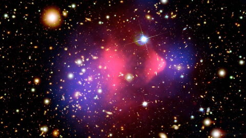 photo of blue and red gas in a distant galaxy