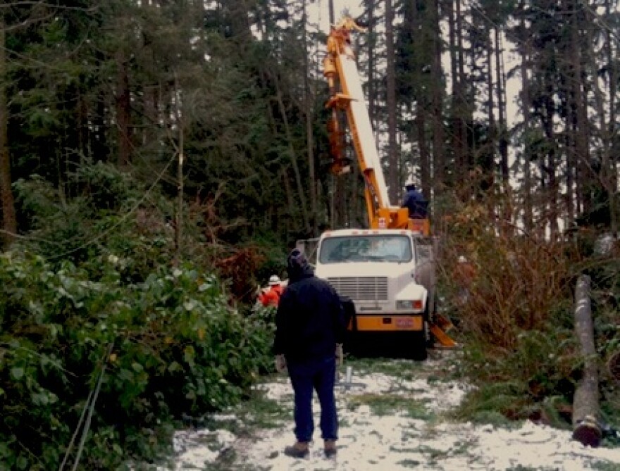 Crews work to fix downed power lines in Kitsap County on Wednesday, Nov. 24, 2010. This photo was shared on Twitter.