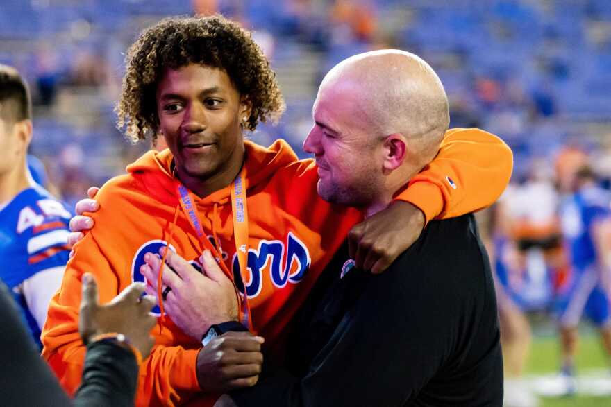 Jaden Rashada hugs UF assistant coach Rob Sale during his campus visit in November 2022. (Matt Pendleton/USA TODAY NETWORK)