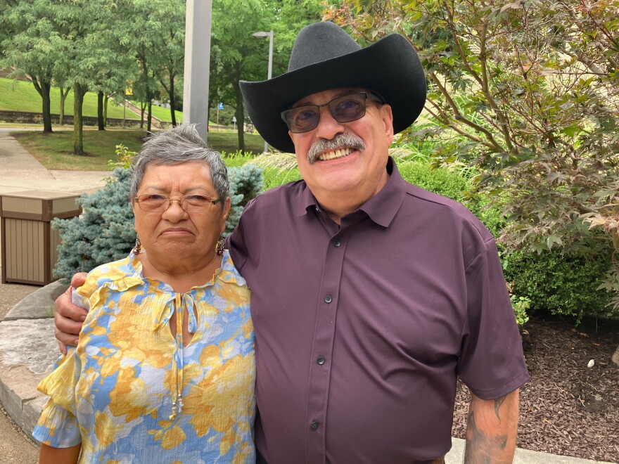 Hector and Maria Castellanos (from Cuba and Mexico, respectively) celebrate his new U.S. citizenship outside Centennial Hall Tuesday, Sept. 15, 2026.