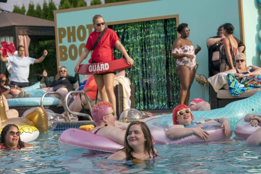 West says swimming is "the greatest of all the human activities" and she mourns the many years that she avoided it because she felt bad about her body. Above, Annie (Aidy Bryant) attends the Fat Babe Pool Party.