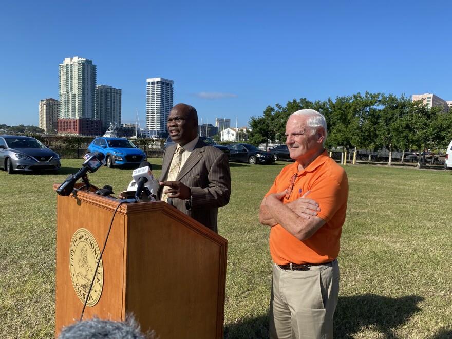 Jacksonville City Councilman Reggie Gaffney and Jacksonville Riverfront Revitalization manager Park Beeler give an update next to the Berkman II demolition site.