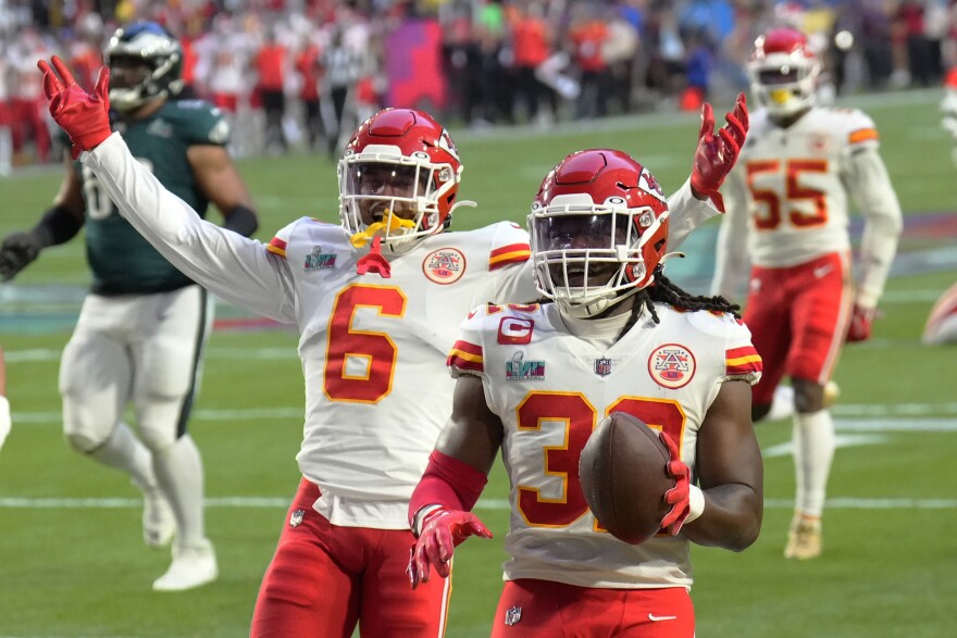 Kansas City Chiefs linebacker Nick Bolton (32) celebrates after scoring a touchdown after recovering a fumble by Philadelphia Eagles quarterback Jalen Hurts (1) during the first half of the NFL Super Bowl 57 football game between the Kansas City Chiefs and the Philadelphia Eagles, Sunday, Feb. 12, 2023, in Glendale, Ariz.