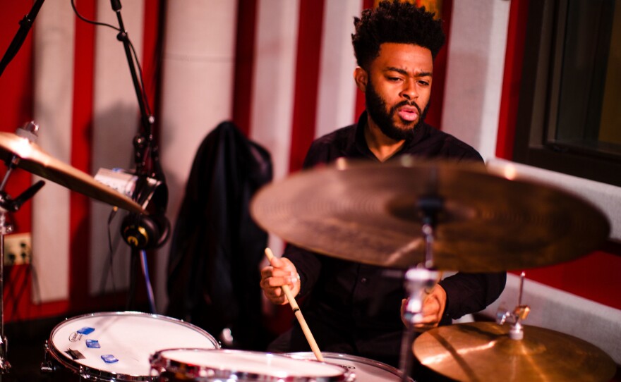 Drummer Jonathan Barber plays in a studio session at KNKX.