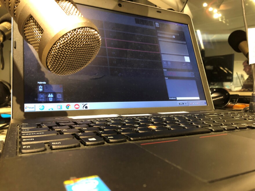 Laptop computer in radio studio