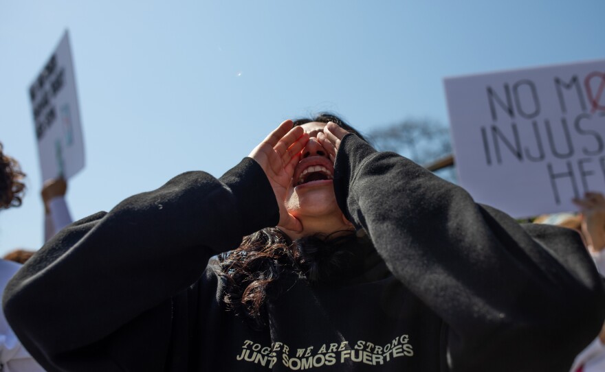 Family friend Katie Martinez Bautista protests for Edilberto Espinoza Sierra in downtown Wilmington on March 14, 2026. Edilberto, 21, was shot and killed by Wilmington Police Department officers and New Hanover County Sheriff's Office deputies in a downtown parking garage during the early morning hours of March 8, 2026. The family is calling for an investigation and release of information surrounding the shooting.