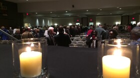 The vigil at the Schultz Campus For Jewish Life in Akron -- part of the Shaw JCC -- began with a lighting of candles for the victims of the Pittsburgh shooting.