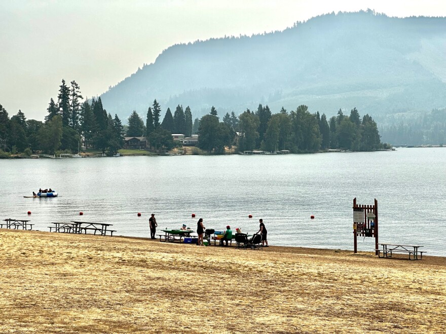 People at smoky beach. 