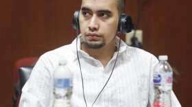 Cristhian Bahena Rivera listens to testimony, through. An English-to-Spanish interpreter during his trial at the Scott County Courthouse in Davenport, Iowa, on Wednesday, May 19, 2021. Rivera is charged with first-degree in the death of Mollie Tibbetts. (Jim Slosiarek/The Gazette)