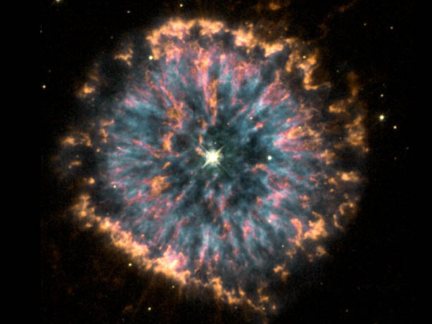 The "planetary nebula" NGC 6751, in the constellation Aquila, is a cloud of gas ejected several thousand years ago from the hot, dying sun-like star visible in its center.