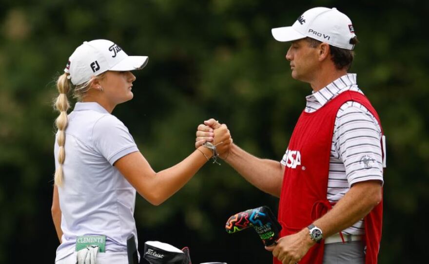 Estero’s Gianna Clemente is greeted by her caddy, Patrick Clemente, her dad, after defeating 2021 U.S. Women’s Amateur champion Jensen Castle Wednesday.