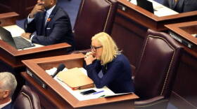Sen. Lauren Book gets emotional on the floor of the Senate on Feb. 21, 2018, after photos of the 17 victims of the shooting at Marjory Stoneman Douglas High School were shown on a screen overhead. She prizes her position on an investigative commission.