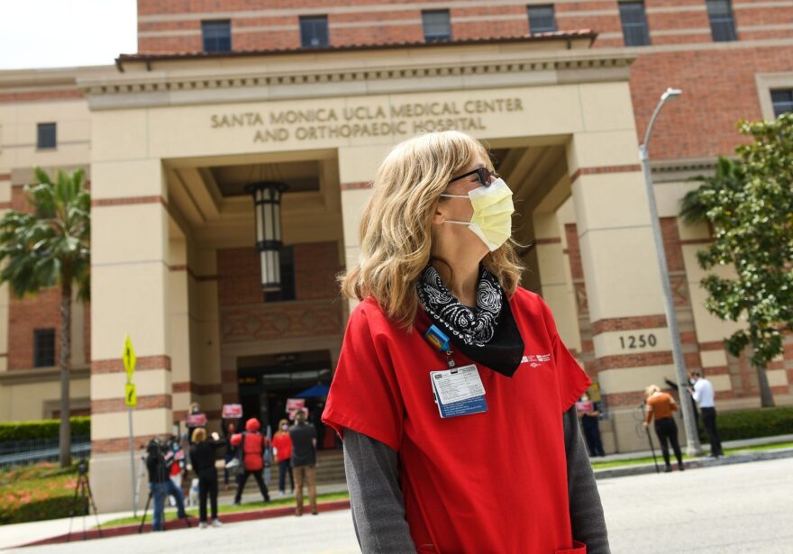 A nurse participates in a rally to support the National Nurses United and California Nurses Association's demand for personal protective equipment for healthcare workers across the state at UCLA Medical Center in Santa Monica.