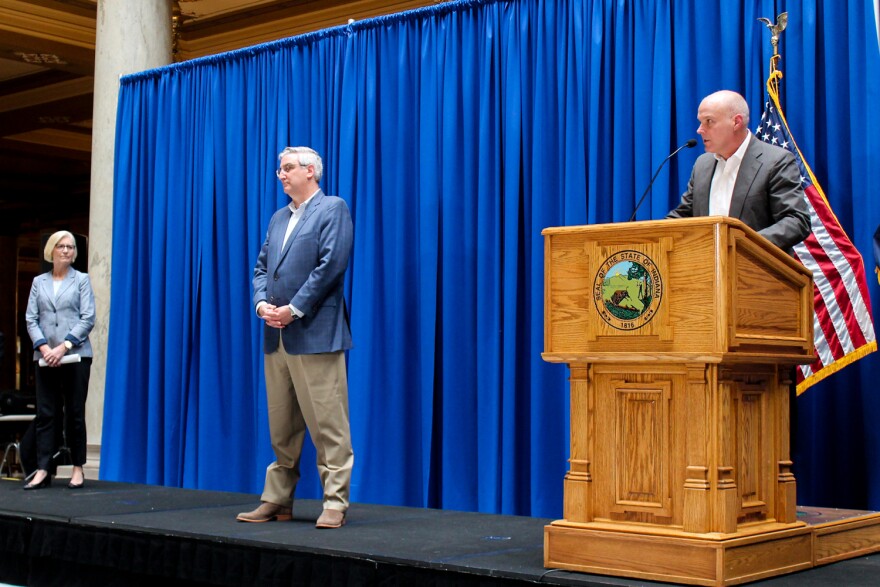 (Left to right) Health Commissioner Kris Box, Gov. Eric Holcomb and Department of Correction Commissioner Rob Carter provide updates on the state's response to the novel coronavirus.