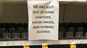 A sign advising out-of-stock sanitizer, facial masks and rubbing alcohol is seen at a store following warnings about COVID-19 in Kirkland, Washington on March 5, 2020. (JASON REDMOND/AFP via Getty Images)