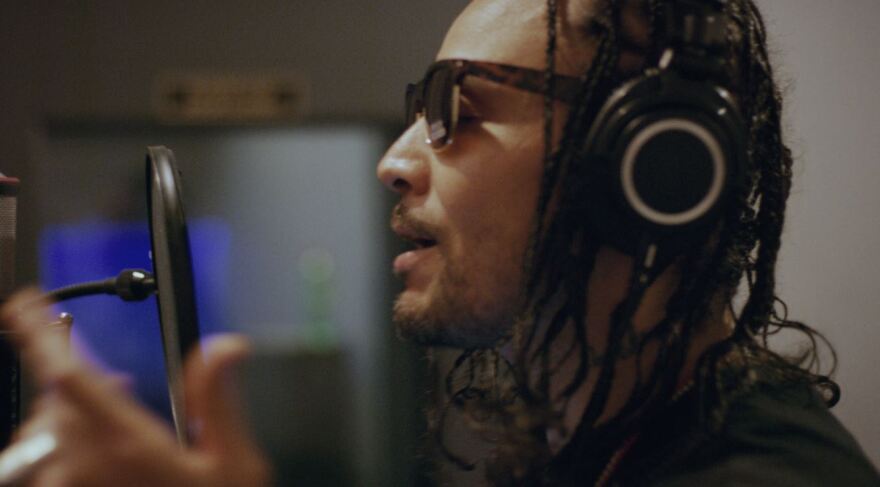 Bizzy Bone in the studio recording the album New Waves.